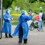 Healthcare workers in protective equipment